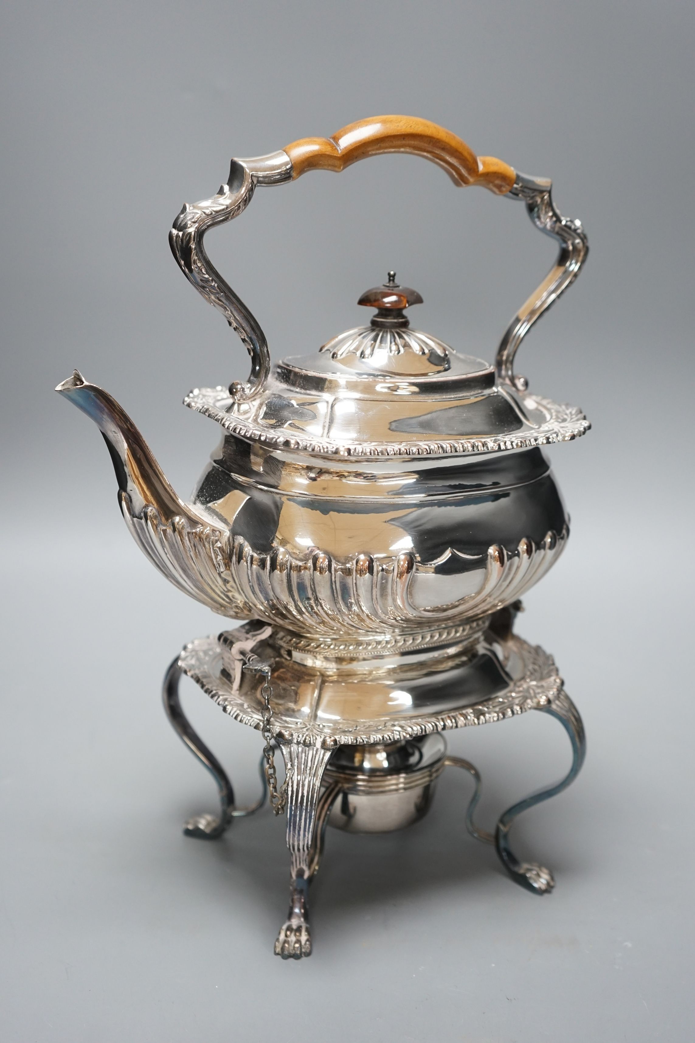 A silver plated kettle on stand, 35cms high